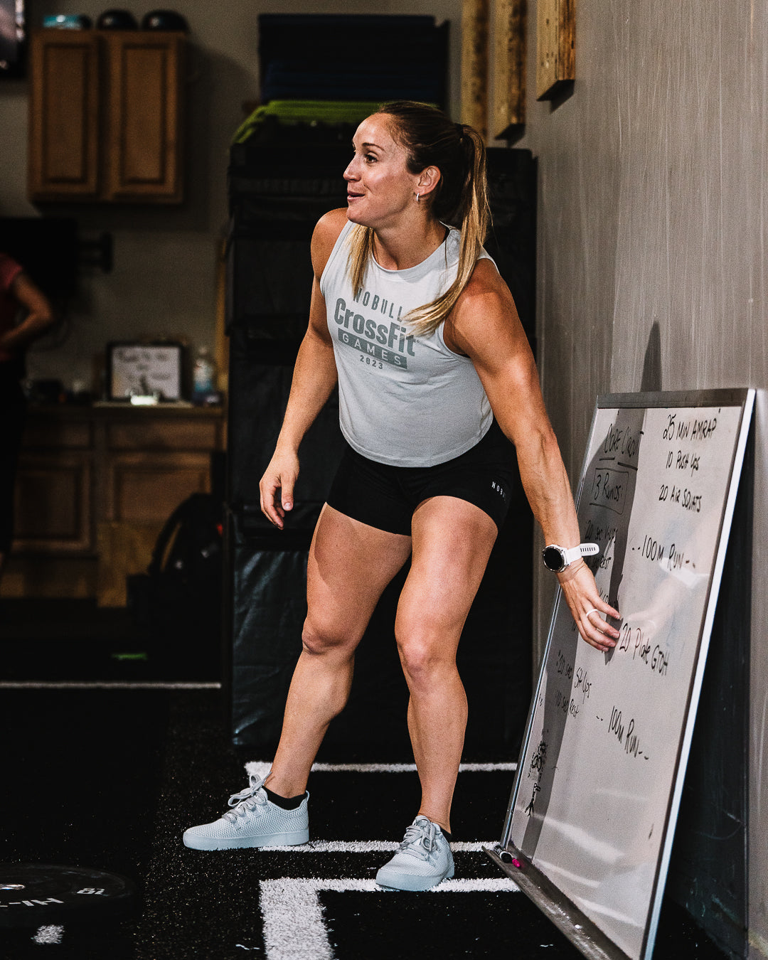 CrossFit athlete Kristi Eramo gets ready to workout wearing casual athletic apprel and arctic print Rec Trainer shoes