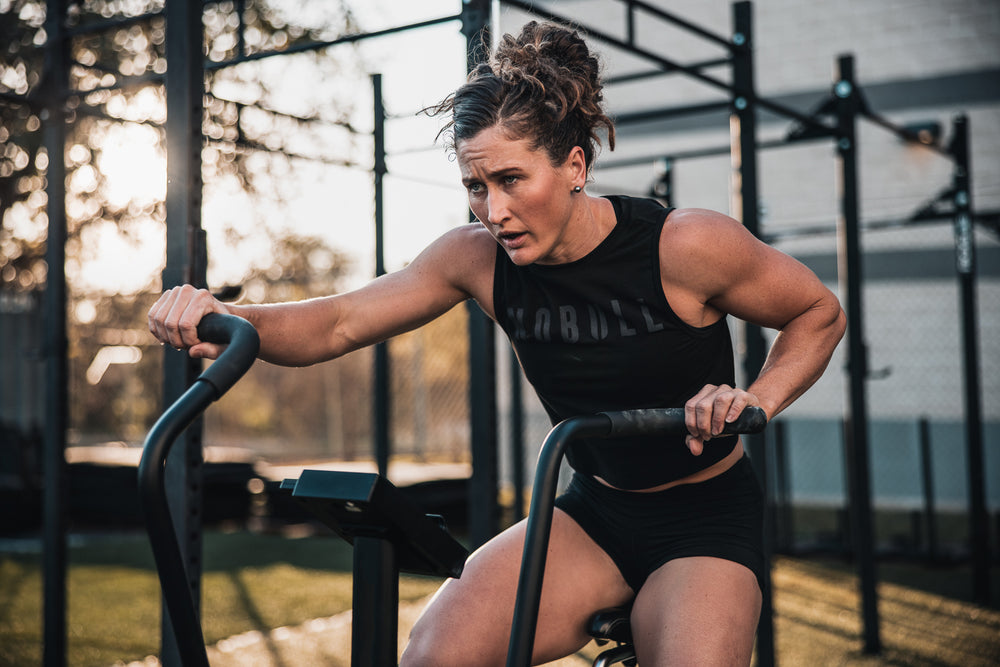 CrossFit Champion Tia-Claire Toomey wears athletic clothing while performing a cardio workout